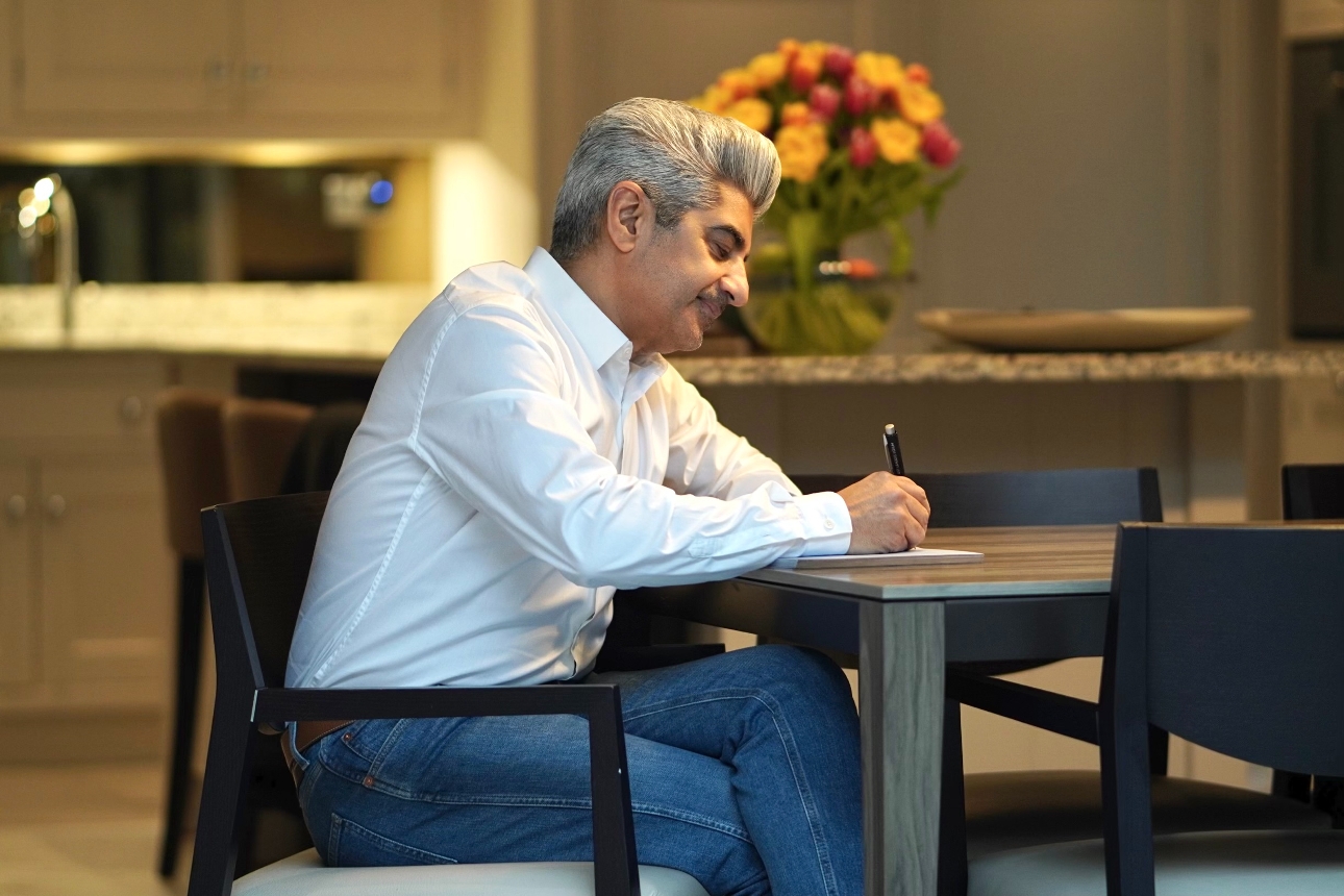 raj at his office desk 