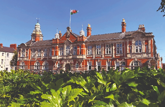 A large orange building with grand windows