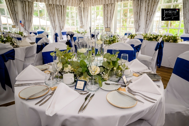 A round table decorated with flowers