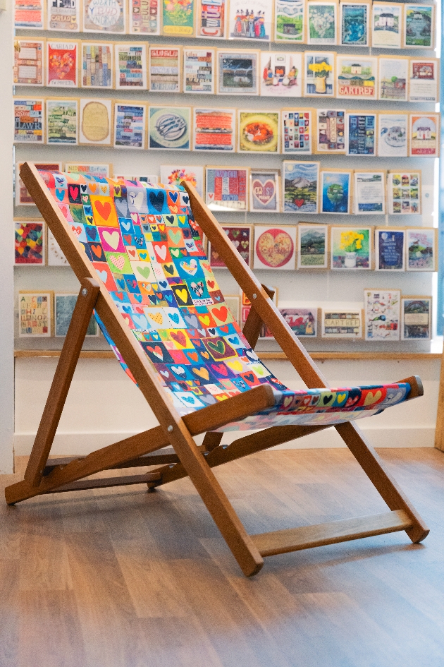 A deckchair decorated with love hearts