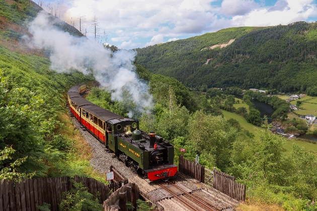 A train going past countryside