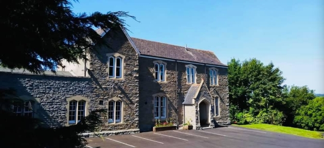 The exterior of a stone building